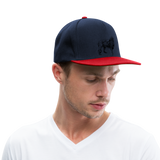 Gorra Snapback "Löwe" - azul marino/rojo